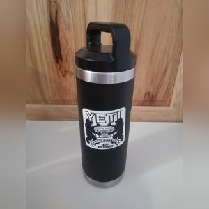 Yeti "Here's to the wild" 18 Oz. travel tumbler.